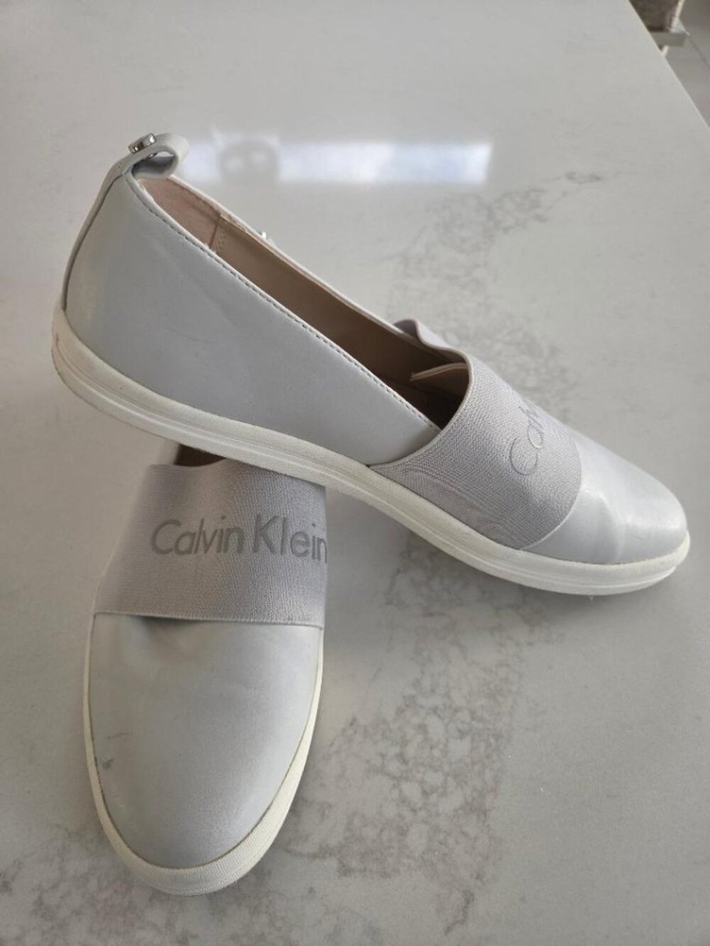 Calvin Klein Women's Pale Grey Leather Slip On Sneakers  9.5